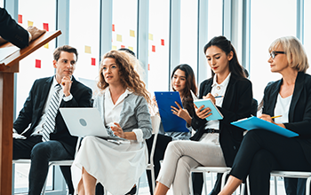 Group of business people meeting in a seminar conference